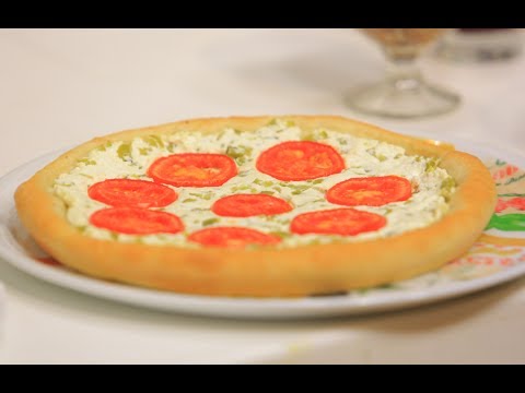 شاهد طريقة تحضير بيتزا الجبن والطماطم
