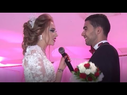 شاهد رد فعل عريس غنت له عروسه بصوت رائع