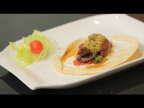 بالفيديو طريقة عمل ومقادير سندوتش سجق في الفرن